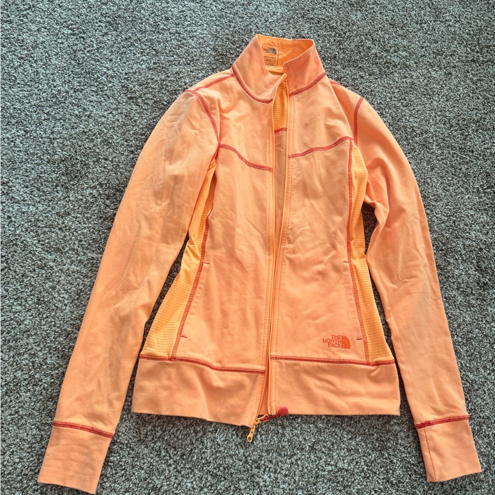 The North Face Orange Ski Jacket with High Collar and Stretchy Material